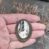 Turkoosisiipinen perhosrintakoru – Vintage-tyylinen pronssinsävyinen rintakoru
